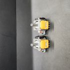 Two yellow analog stick replacement modules for Xbox controller